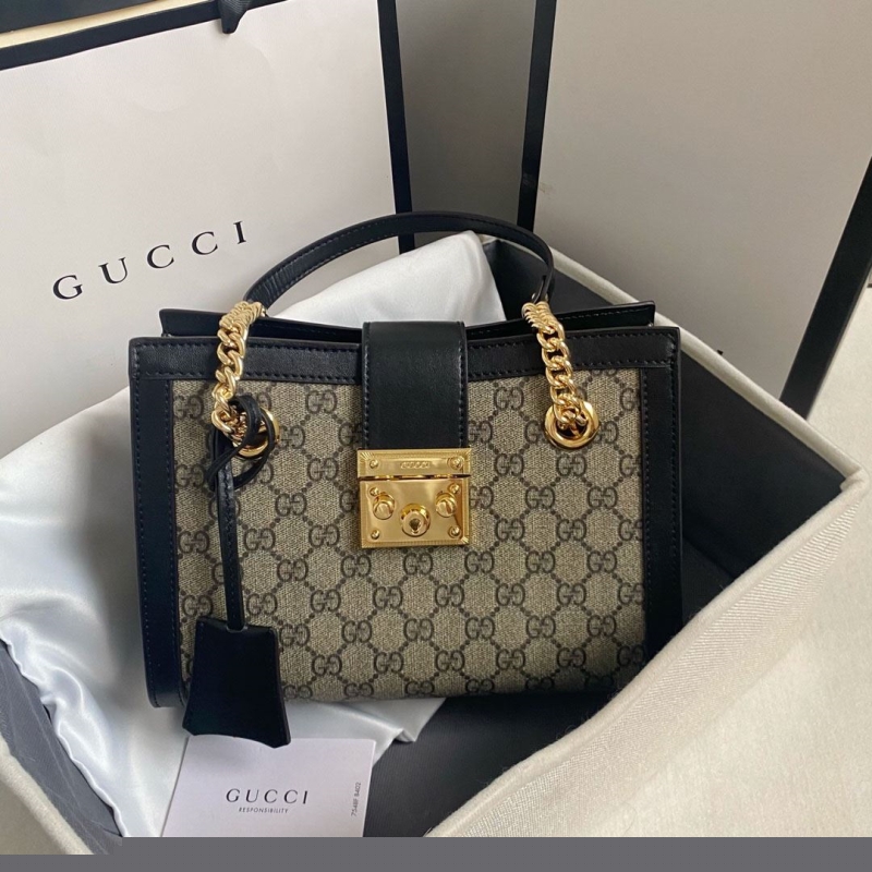 G*u*i shopping bags